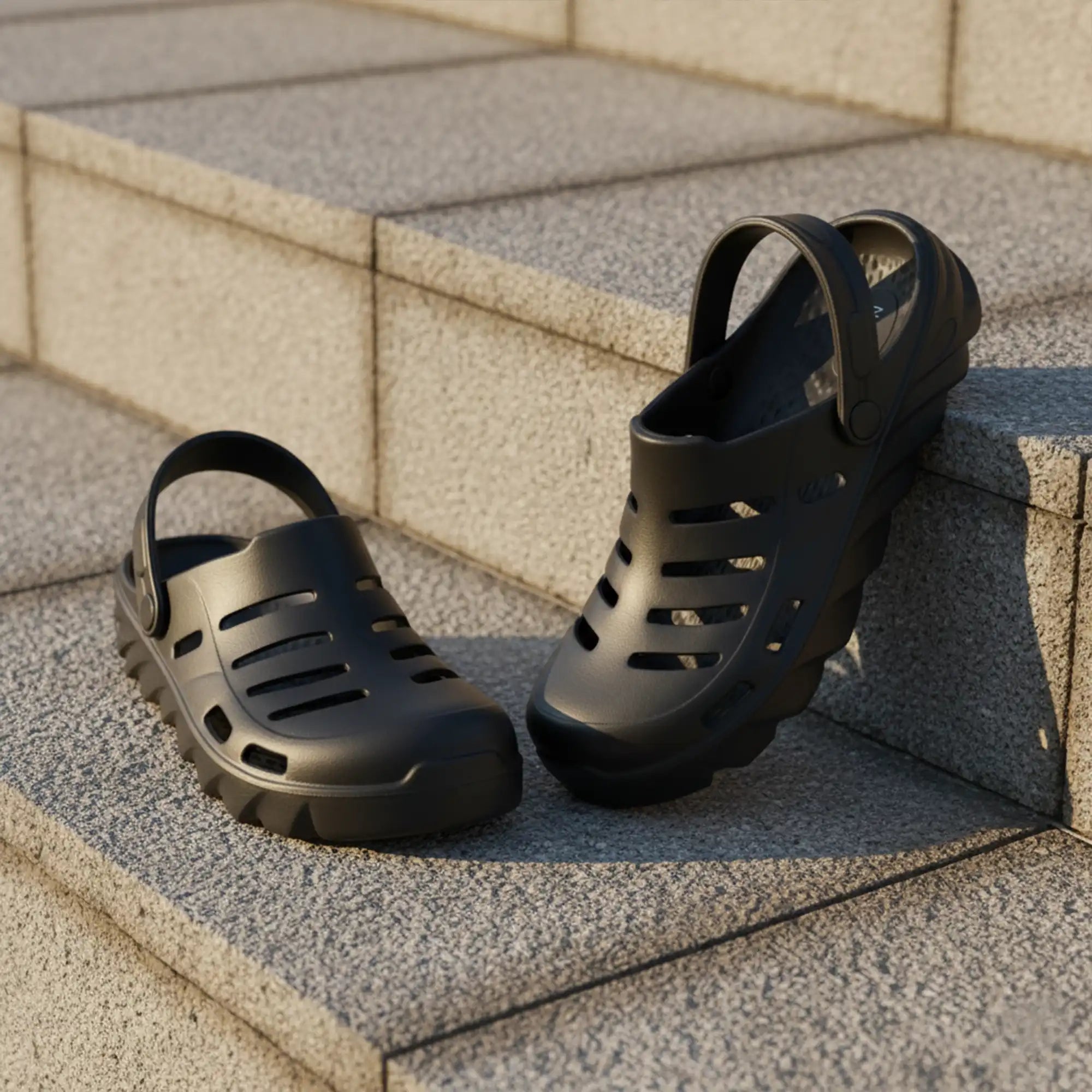 NoStrain Men Black clogs on a stone step