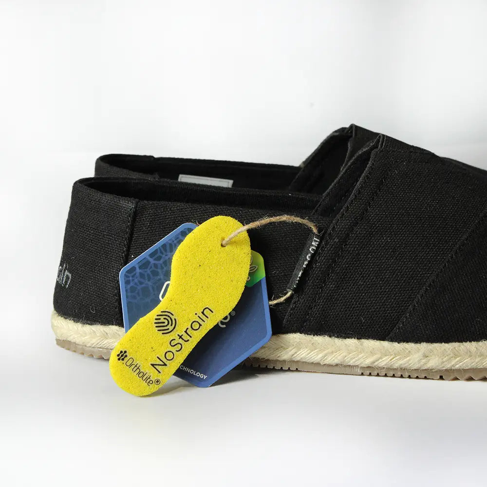 Best black canvas espadrilles for men in India by NoStrain featuring breathable cotton slip-ons with ISI mark and Ortholite comfort.