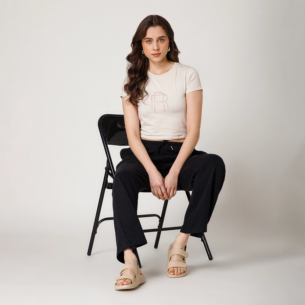 Comfortable women's PU sole sandals by NoStrain featuring beige leather and durable hook loop straps.