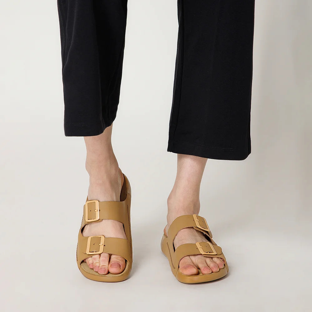 Durable NoStrain camel leather slides for women with adjustable buckle straps and comfort PU outsole.