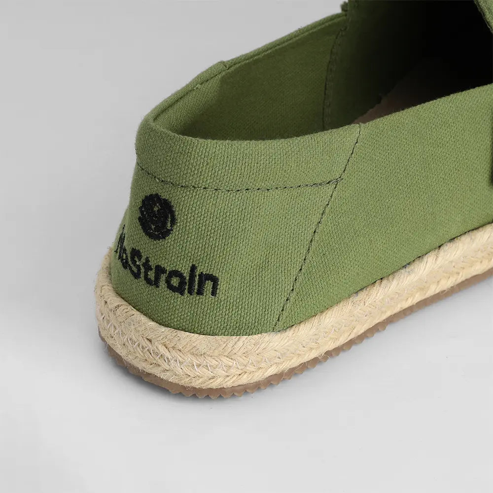 Lightweight olive green canvas shoes with slip-on design