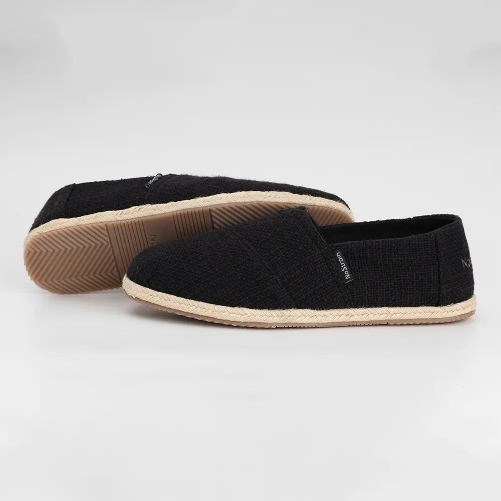 ISI marked women's slip-on shoes with comfortable lace trim detail.