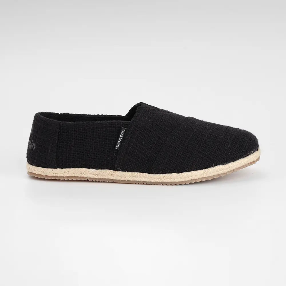 Women's 100% cotton slub slip-ons with flexible sole and lace accents.