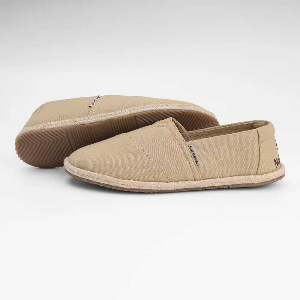 NoStrain beige canvas round-shaped espadrilles for women featuring a comfortable slip-on design.