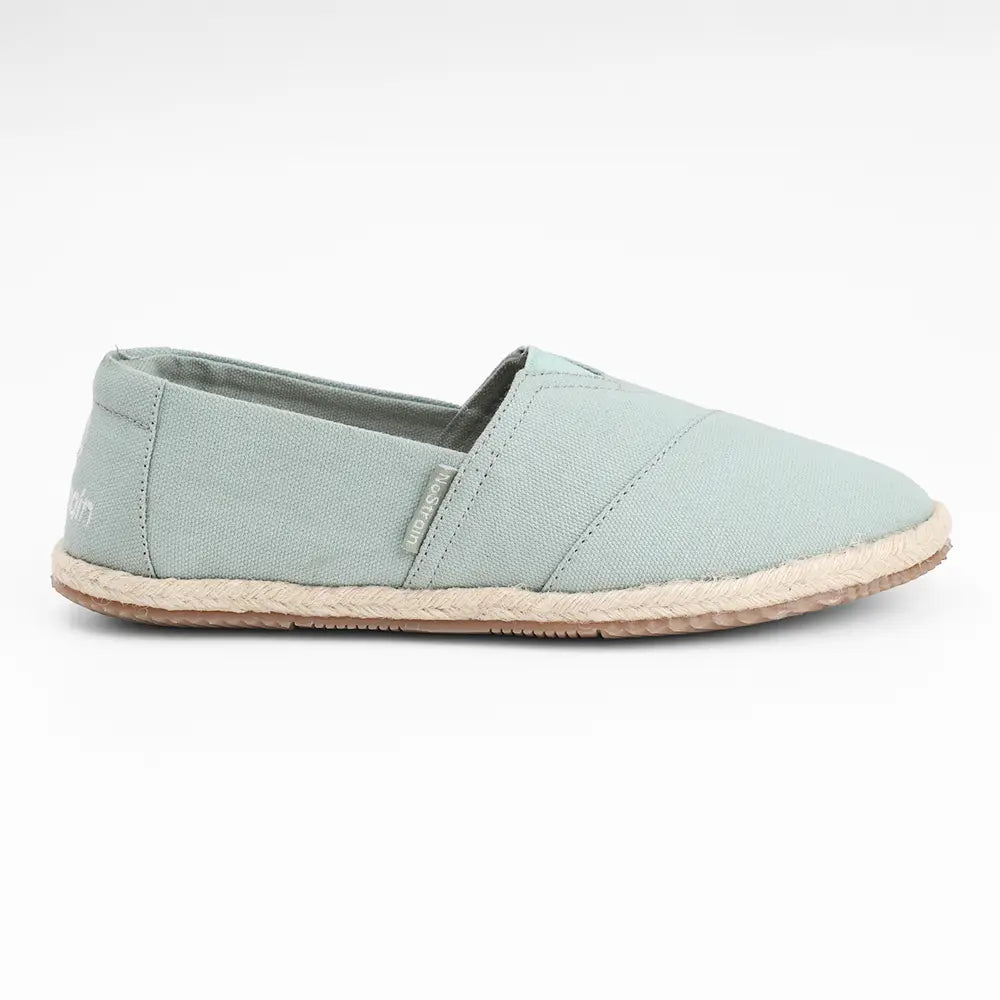 Stylish and breathable sage green slip-on footwear for women by NoStrain for a versatile look.