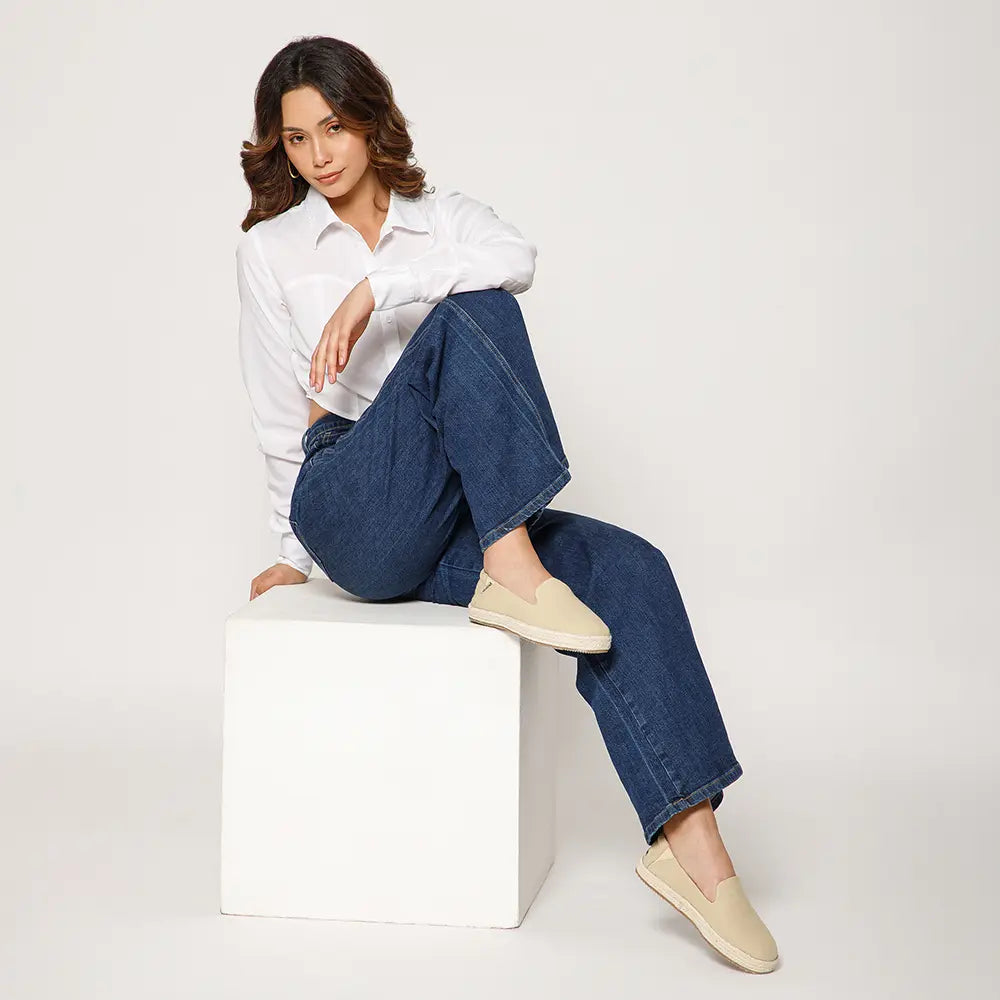 Easy-to-wear beige cotton slip-ons for women by NoStrain designed for all-day walking comfort.