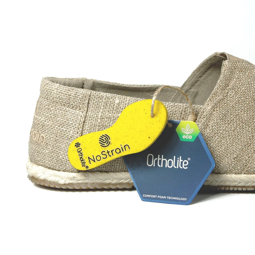 Beige shoe with NoStrain and Ortholite tags