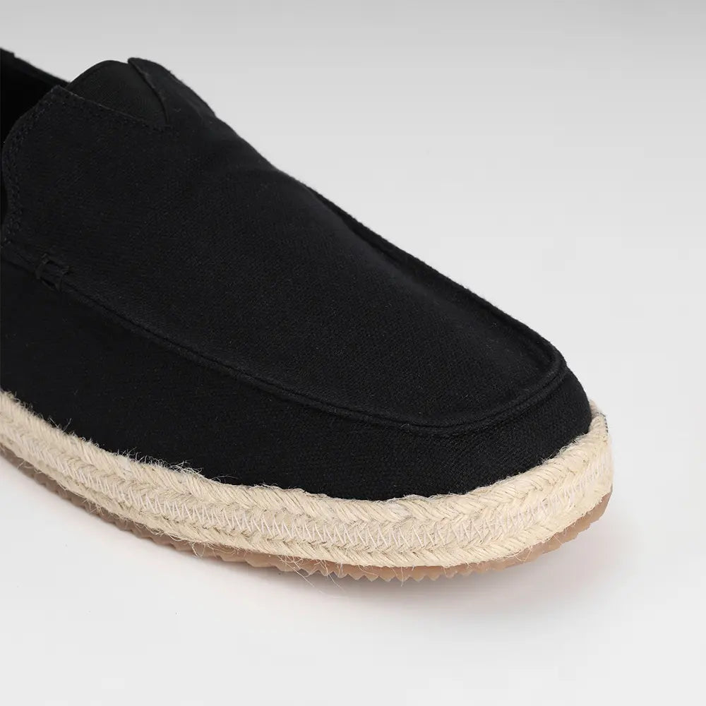 Men's black canvas flats with flat heel
