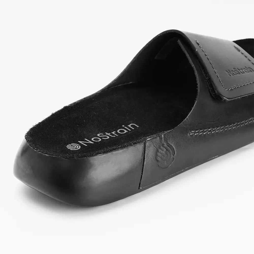 ISI marked black sliders with a supportive PU outsole, ensuring durability and comfort.