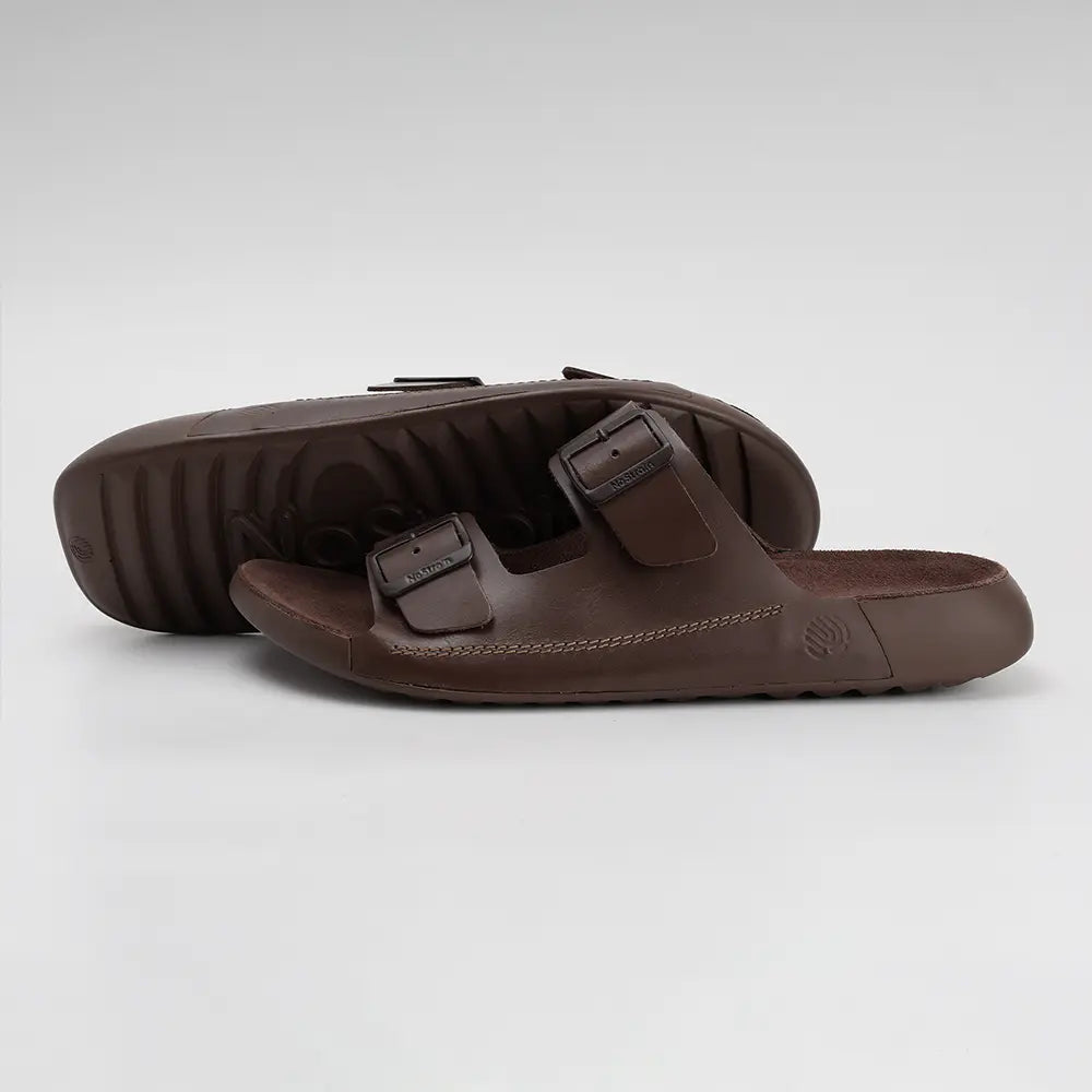 Stylish NoStrain ladies brown leather sandals with front buckle straps and comfort grip.