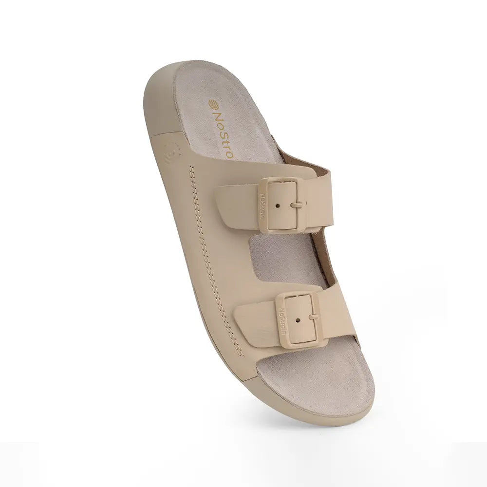 NoStrain women's beige leather flats with high-quality buckle straps and supportive outsoles.