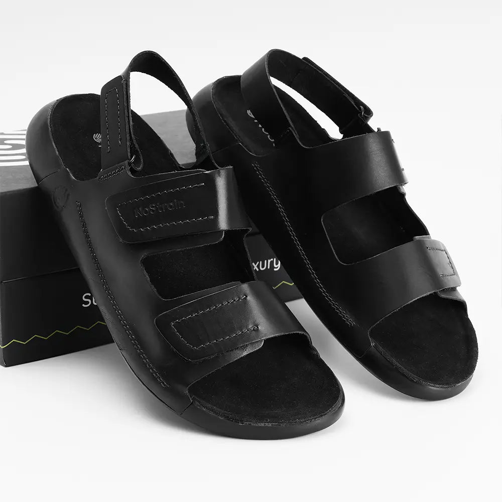 Women's stylish black sandals built with ISI marked premium quality leather.