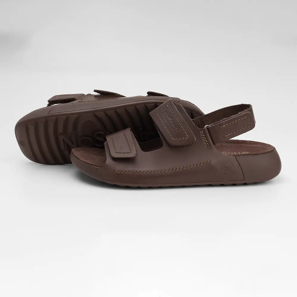 NoStrain women's flat brown leather sandals designed for long-lasting comfort and effortless style.