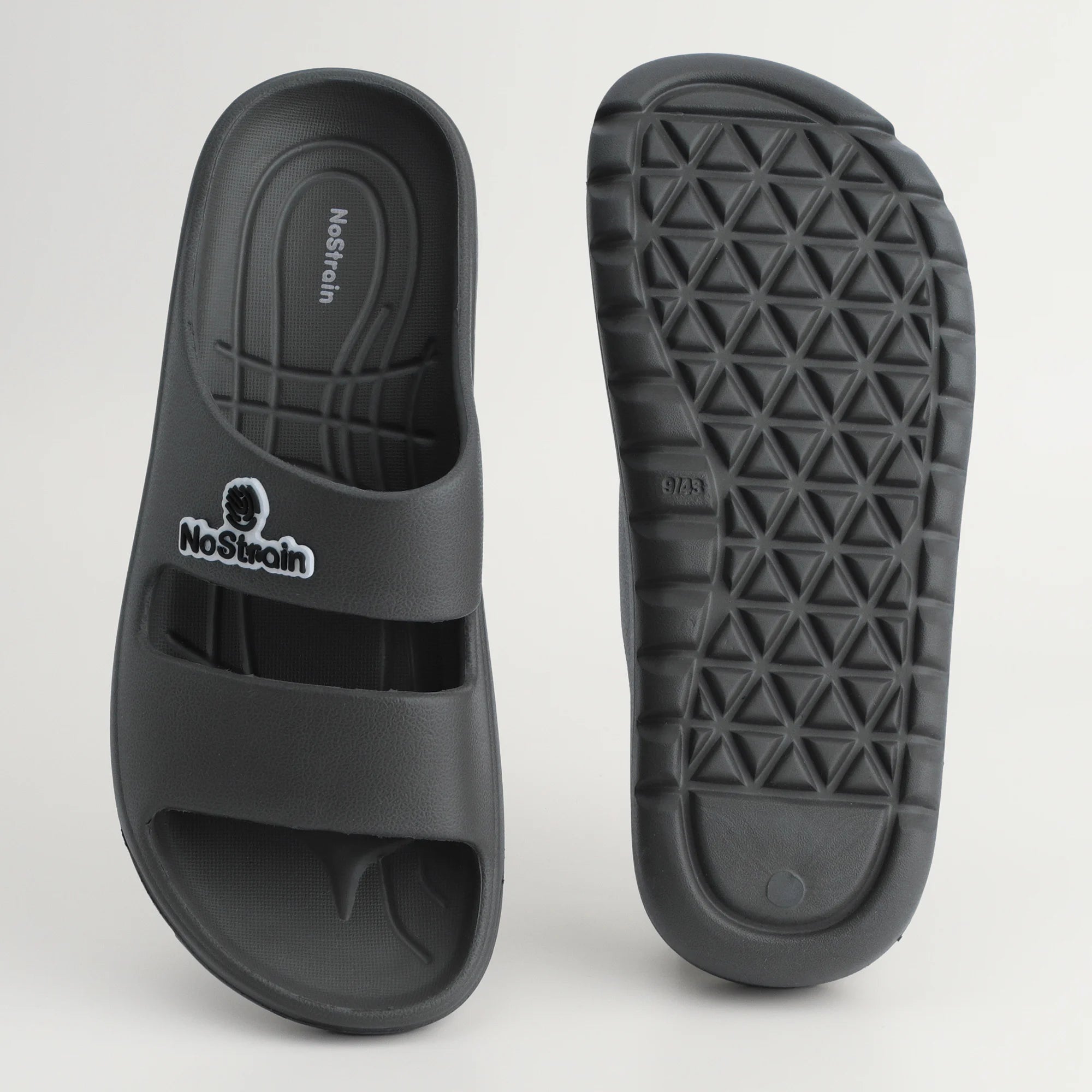 Close-up of EVA sandal showing textured insole and wide molded straps.