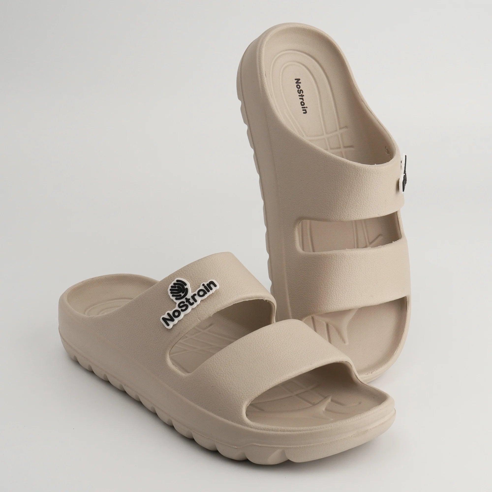 sandal highlighting heel support and tread pattern.