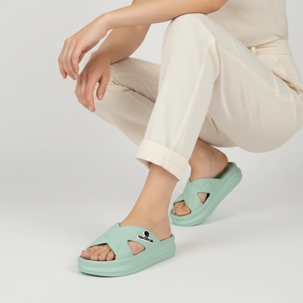 NoStrain women’s waterproof cross strap sandals with soft cushioned support for all-day comfort.