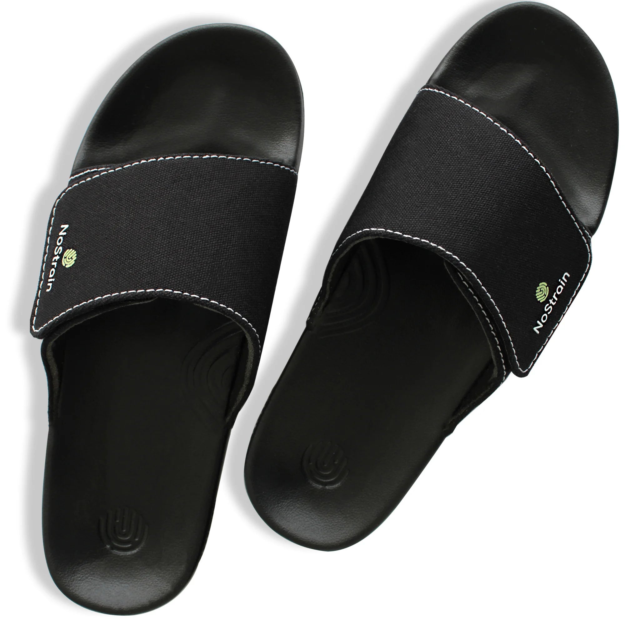 Black canvas sugar sliders with a contrasting sole, adding a touch of detail.