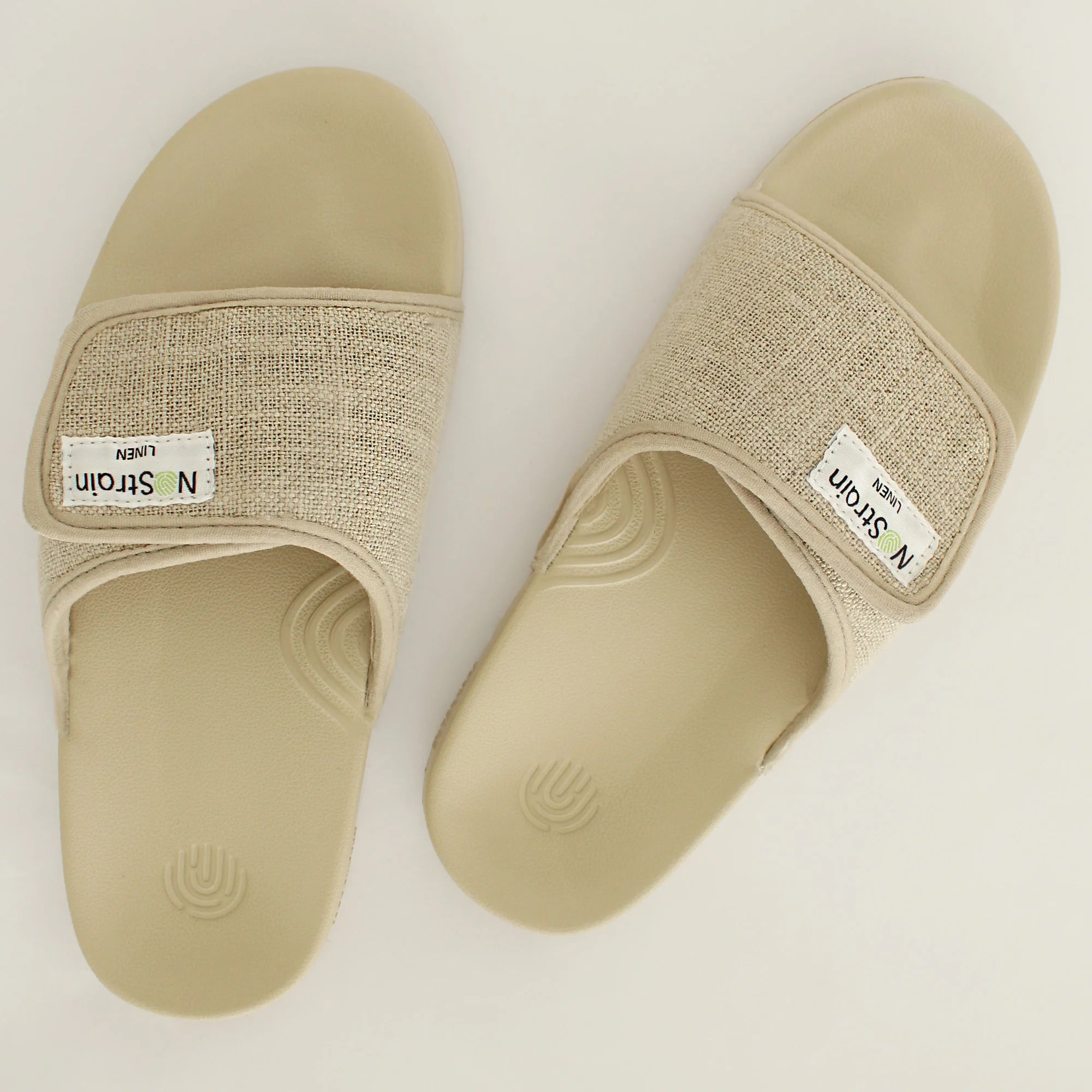 Make a subtle statement with Women's Sandy Beige Linen Sugar Sliders, blending simplicity with sophistication.