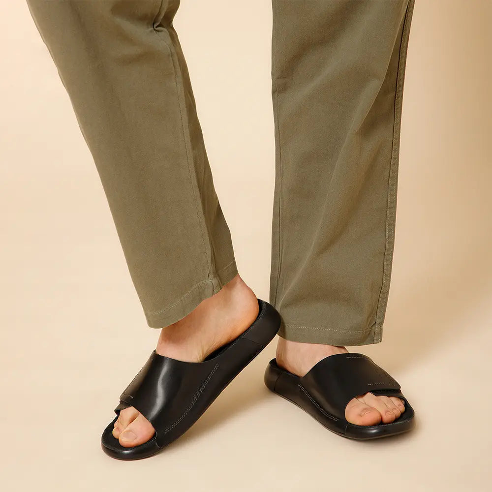 Best Indian Leather Footwear: NoStrain Men's Black Broad Strap Sliders with Premium Leather and Adjustable Closure.