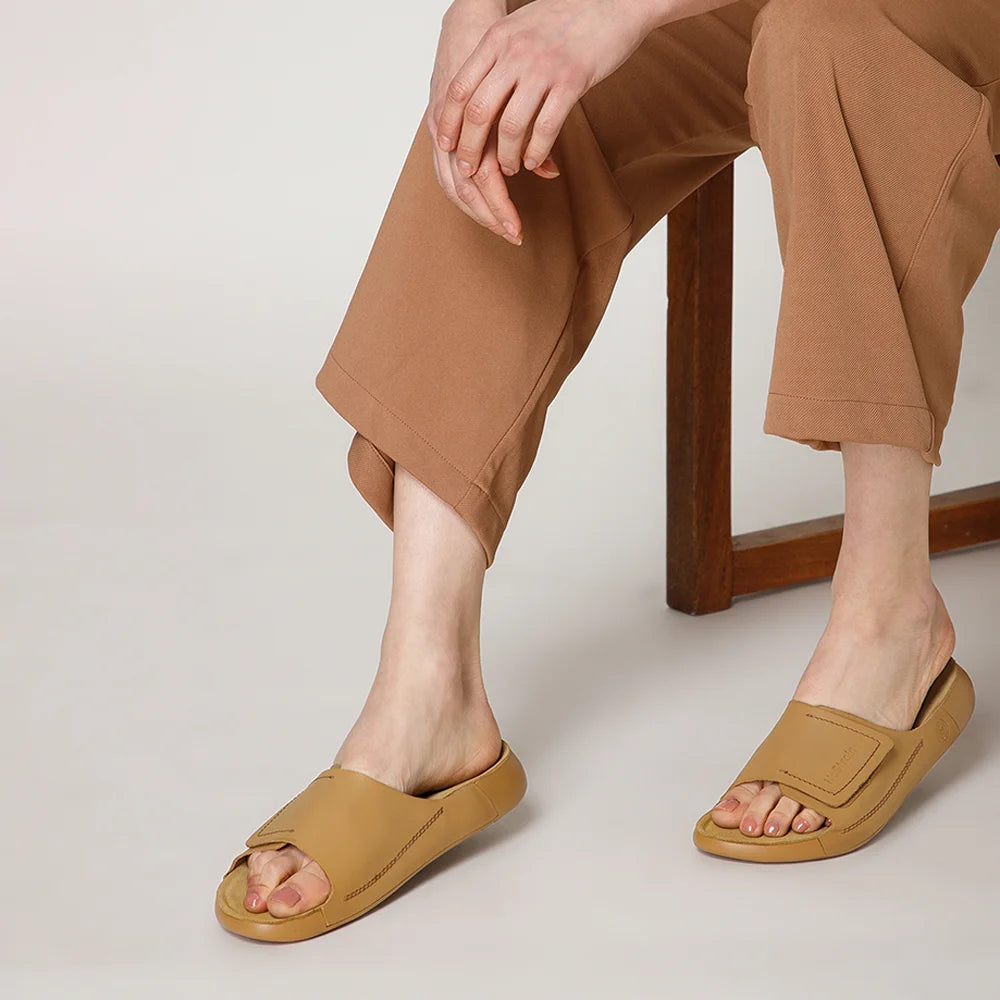 NoStrain women camel leather sliders with broad strap design and ISI marked premium quality.