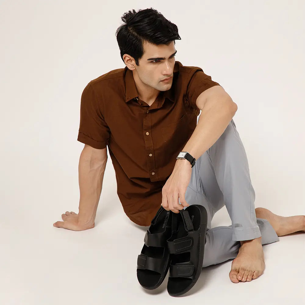 NoStrain premium black leather sandal, featuring adjustable hook & loop closures on front and back strap.