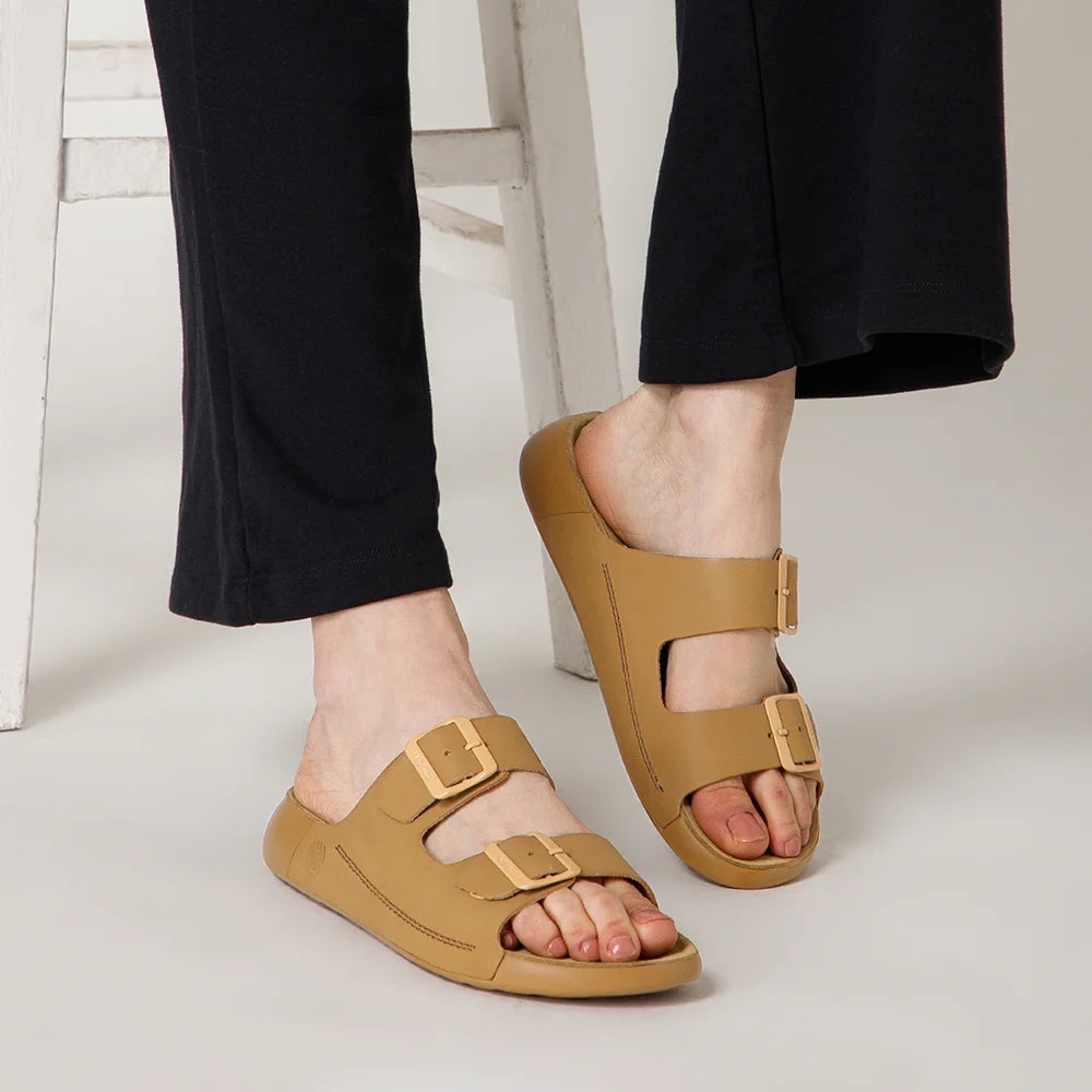 Comfortable NoStrain ladies camel footwear featuring durable PU outsole and stylish buckle closure.