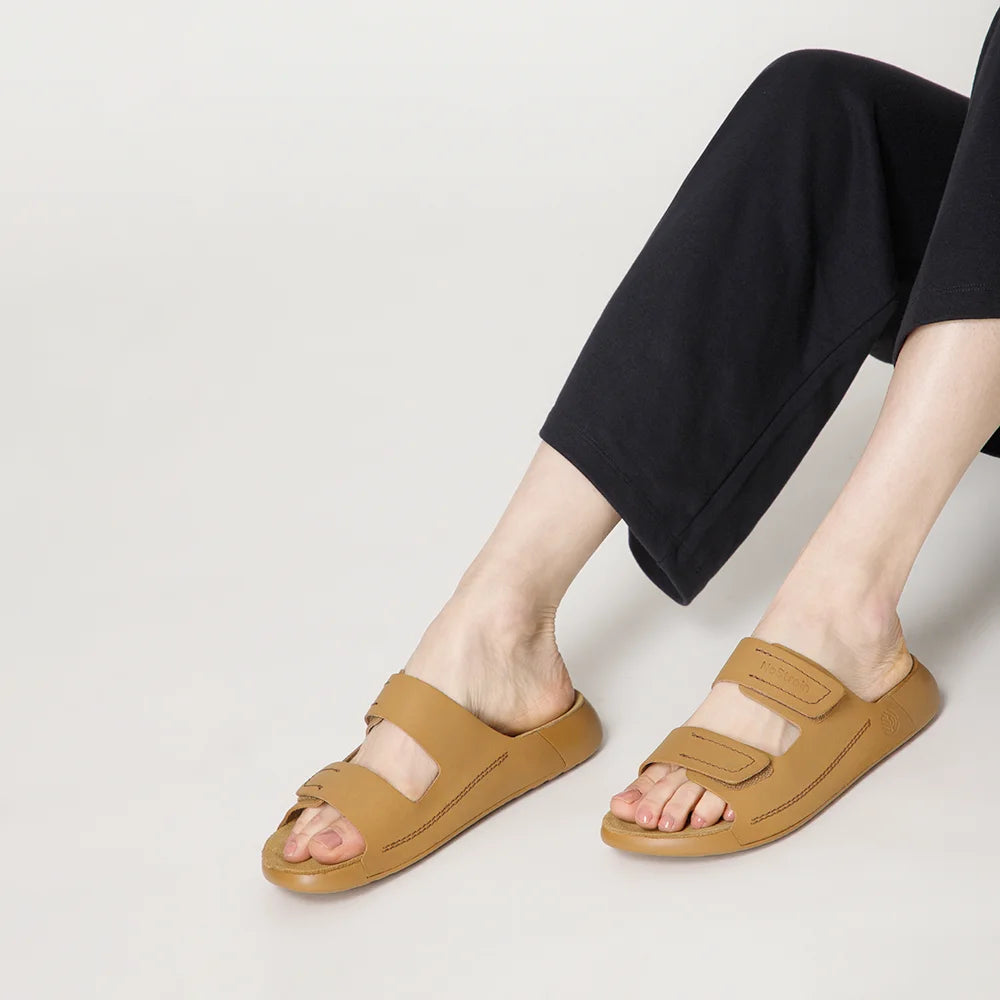 Premium NoStrain camel leather sandals for women with lightweight PU outsole and durable straps.
