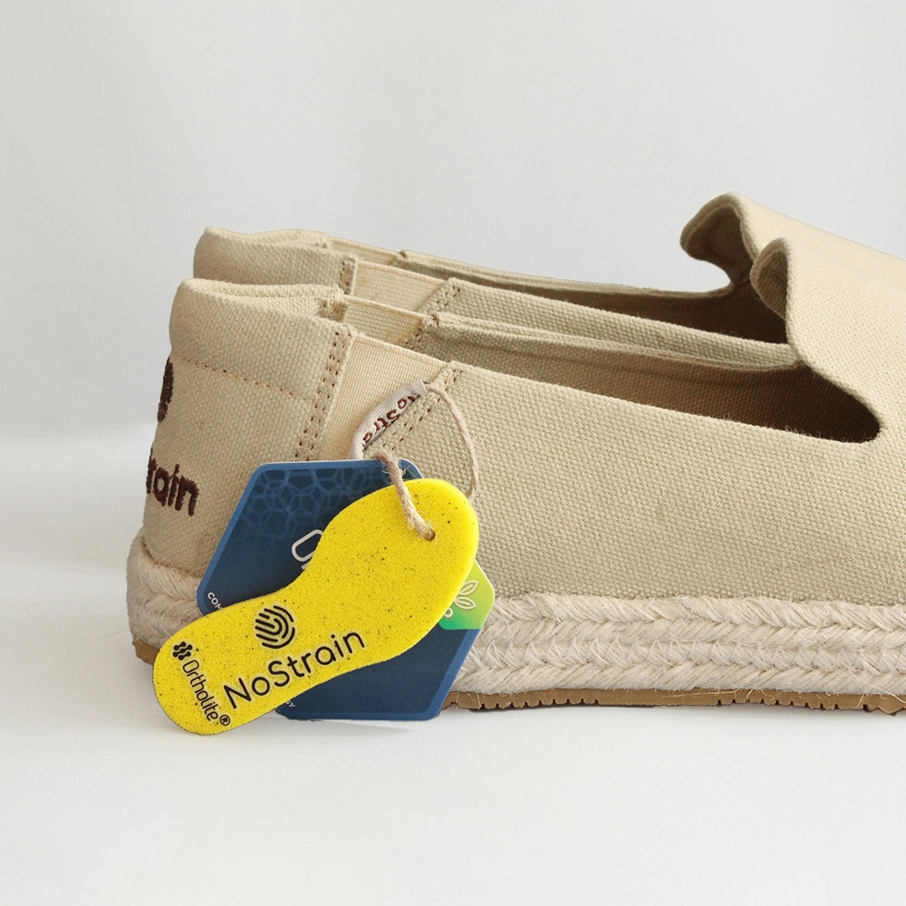 Women’s Beige Cotton Canvas Slip-On Espadrilles by NoStrain featuring Breathable Upper, Ortholite Comfort Insole, and Anti-Skid Outsole.