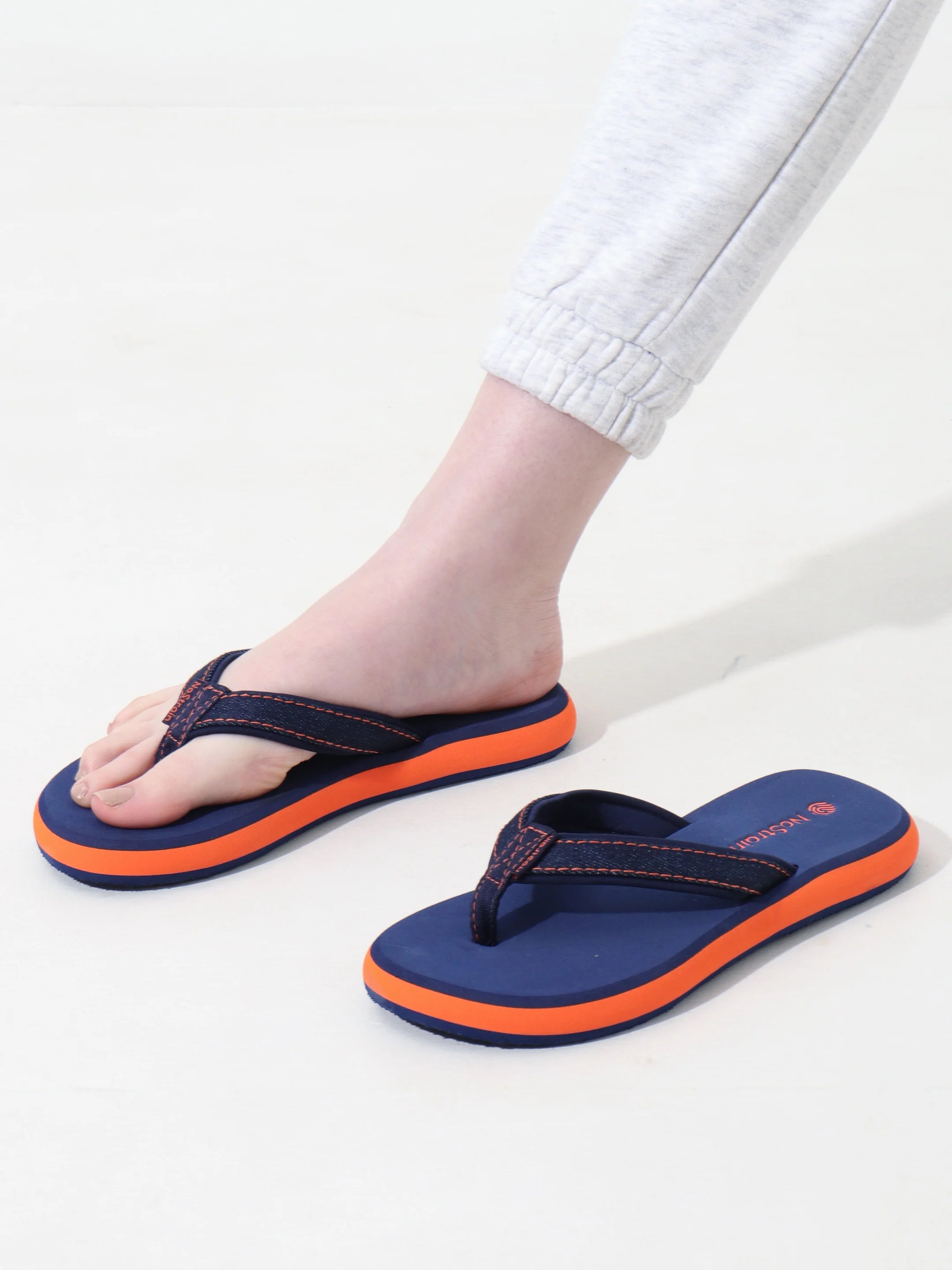 nostrain slippers with stitched straps