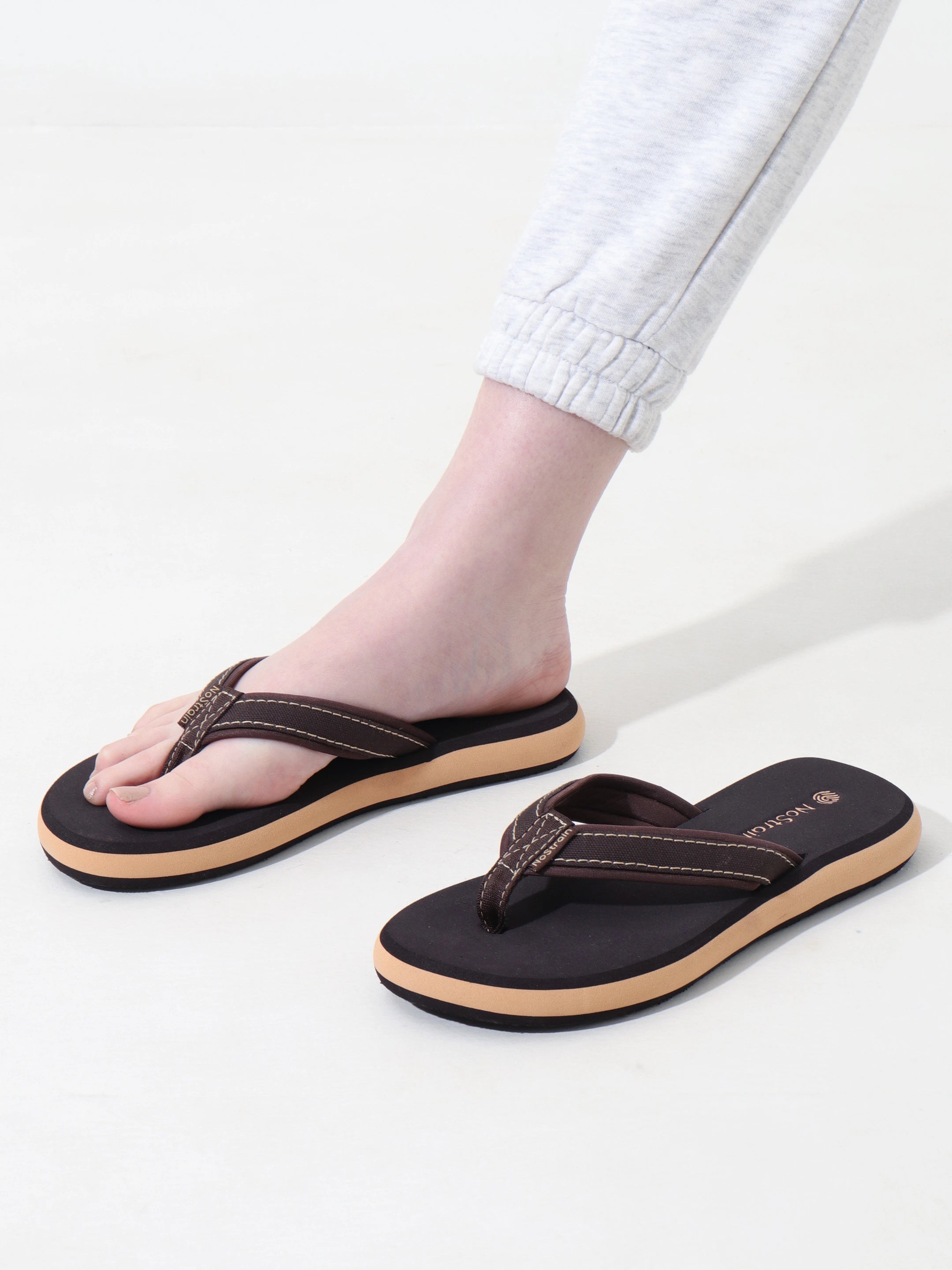 stylish slippers with stitched straps