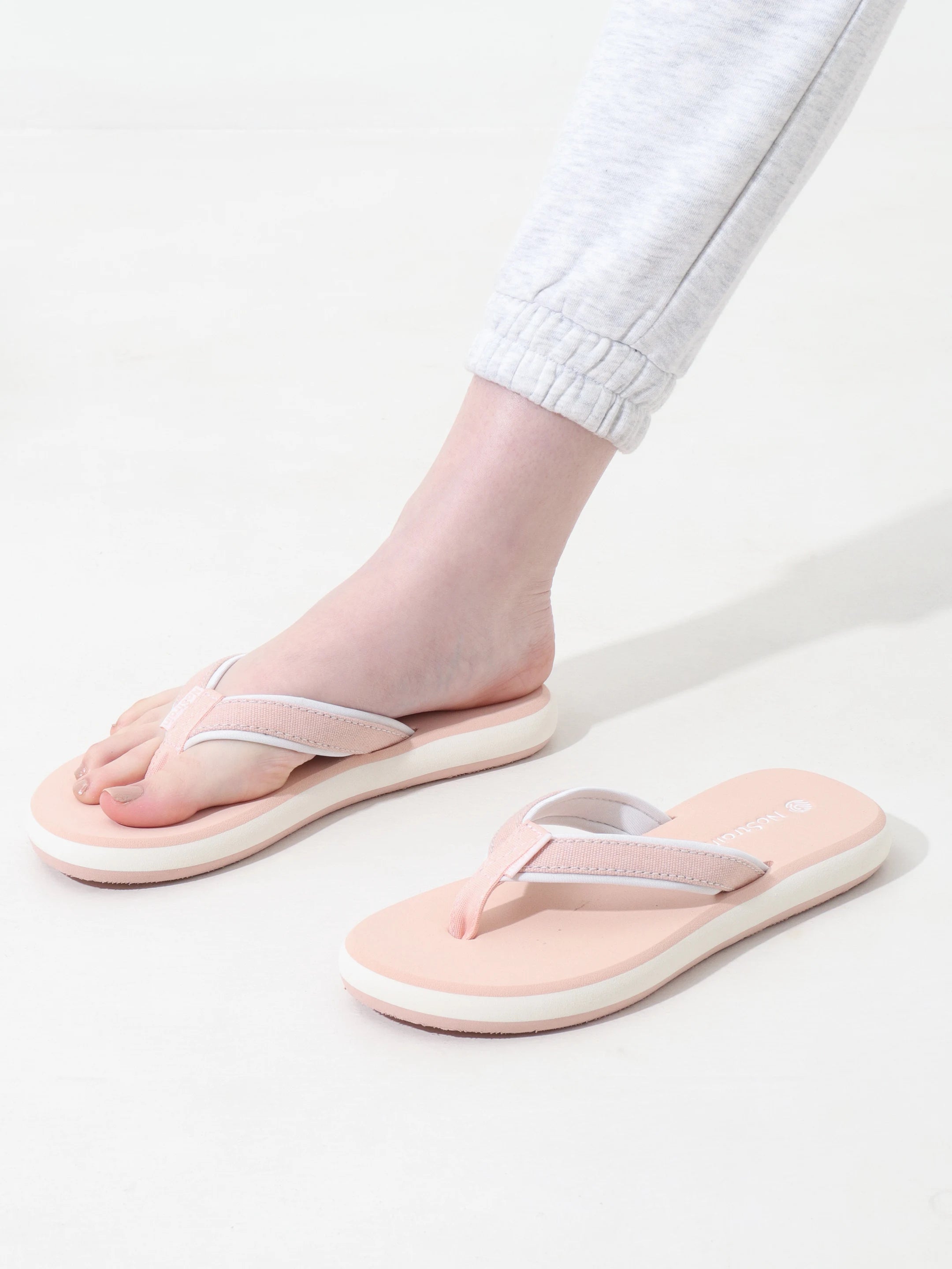 stylish slippers with stitched straps