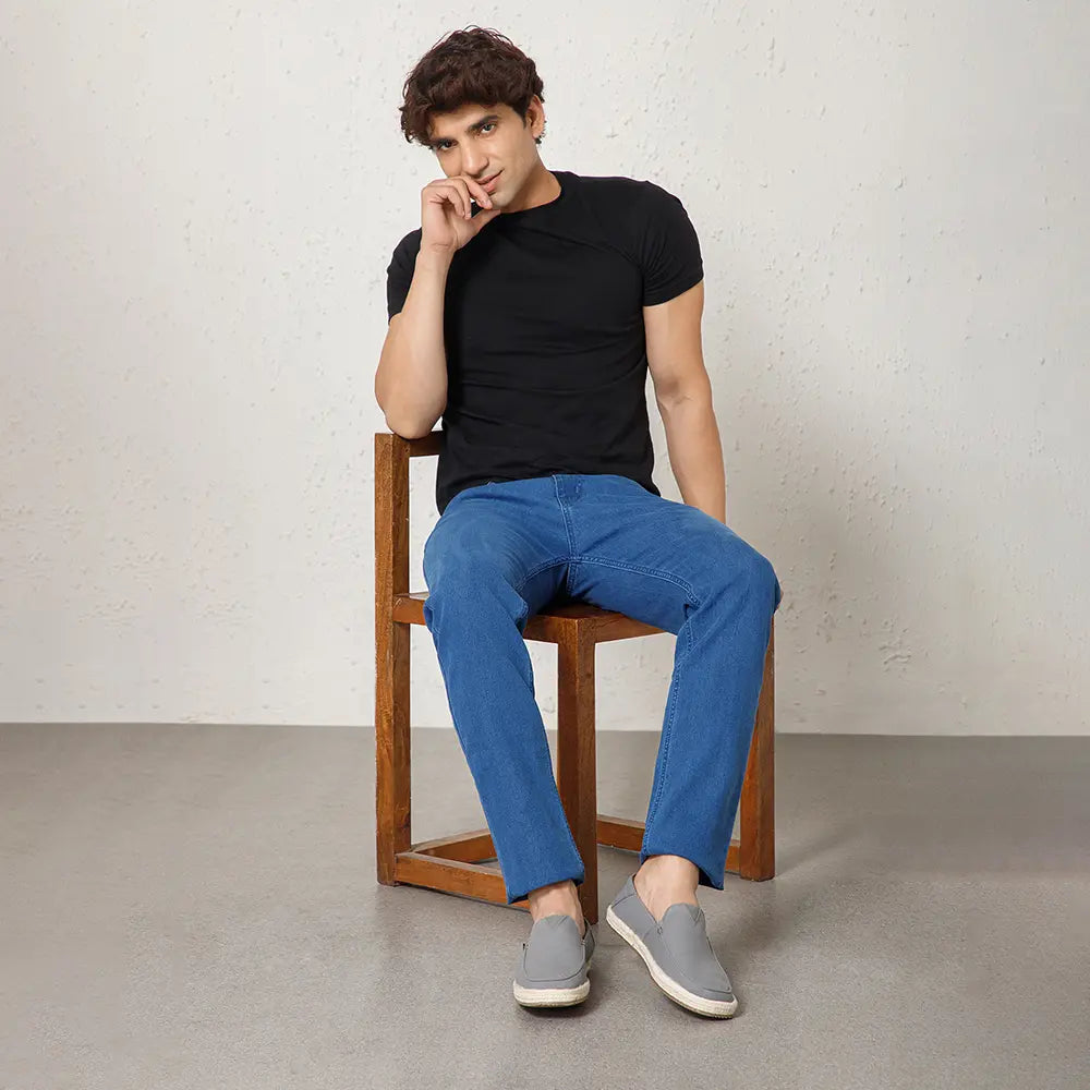 NoStrain brand grey slip-on shoes for men showing the ISI marked quality and durable construction.