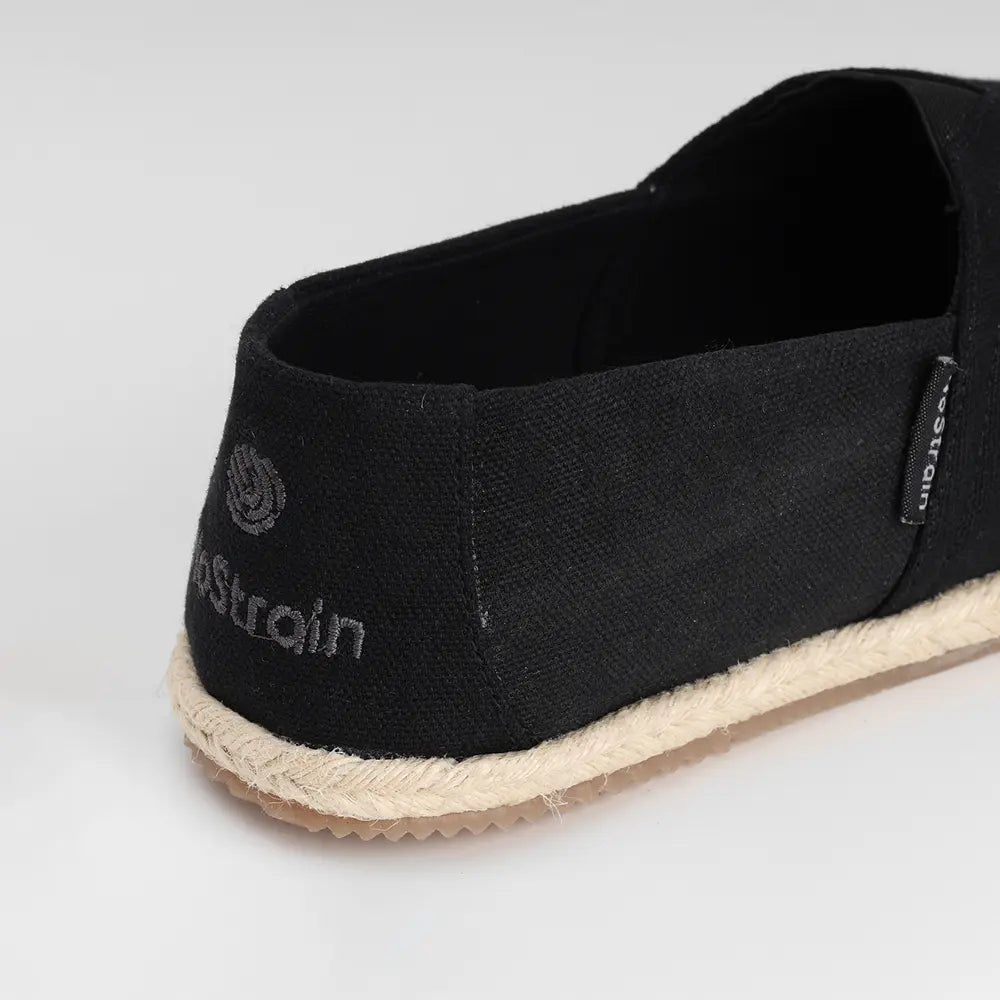 Ladies black canvas slip-ons with removable washable insole