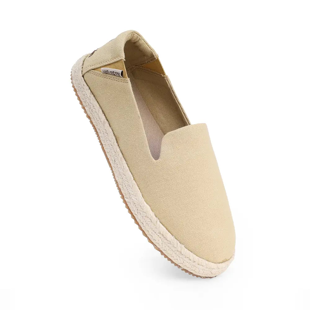 Lightweight beige travel shoes for women by NoStrain featuring a soft cushioned footbed.