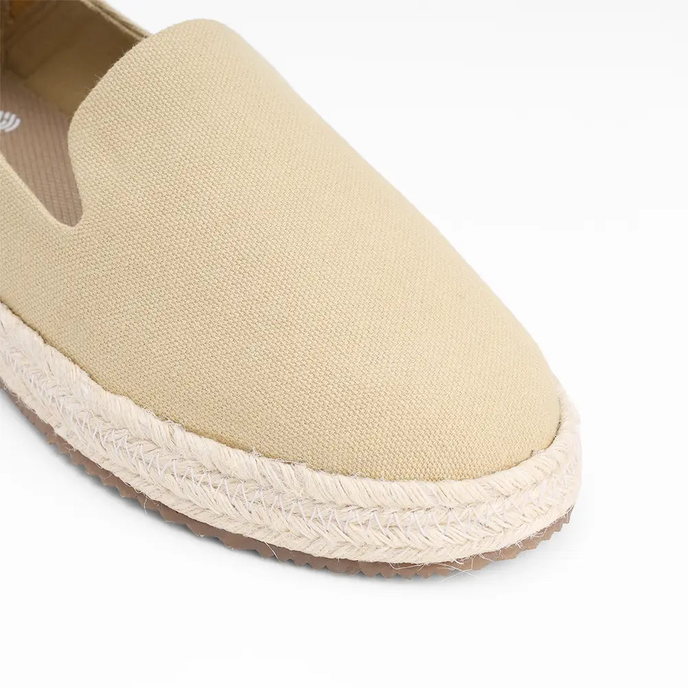 beige canvas slip-on shoes for women