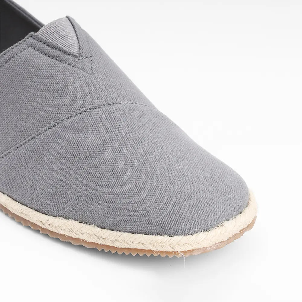 Men's lightweight slip on canvas shoes in grey by NoStrain with a comfortable walking sole.