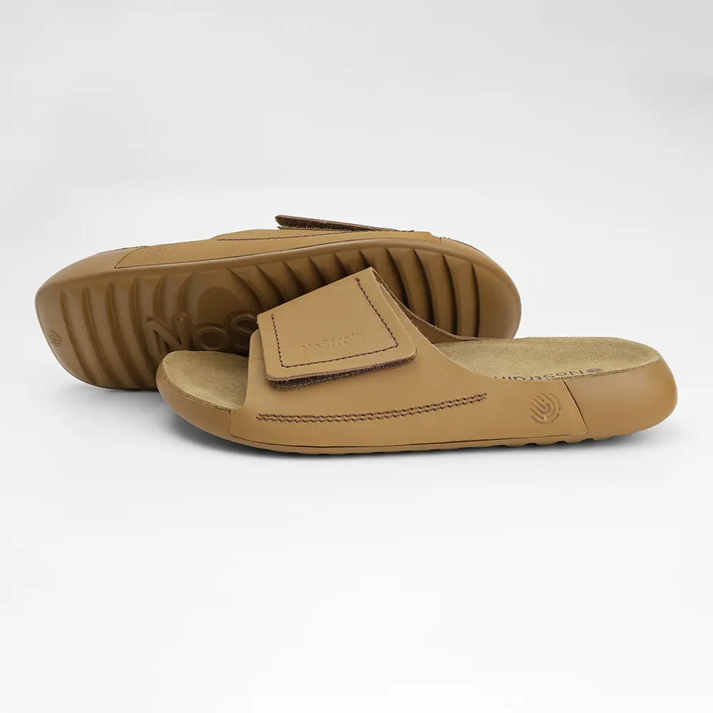 Stylish NoStrain flat leather sliders in camel color with BIS certified straps and lightweight PU grip.