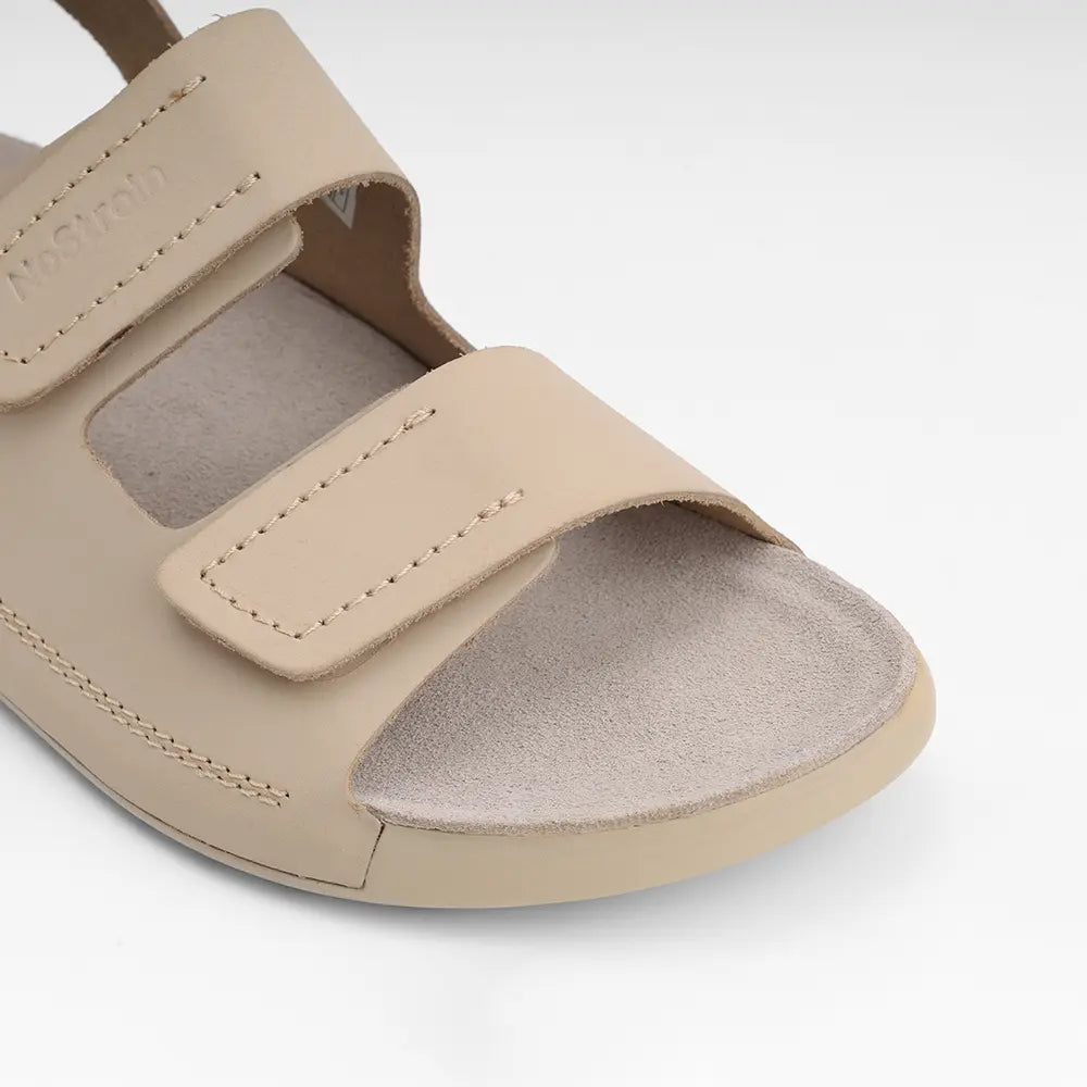 NoStrain women's leather sandals in beige with adjustable back straps and premium ISI mark quality.