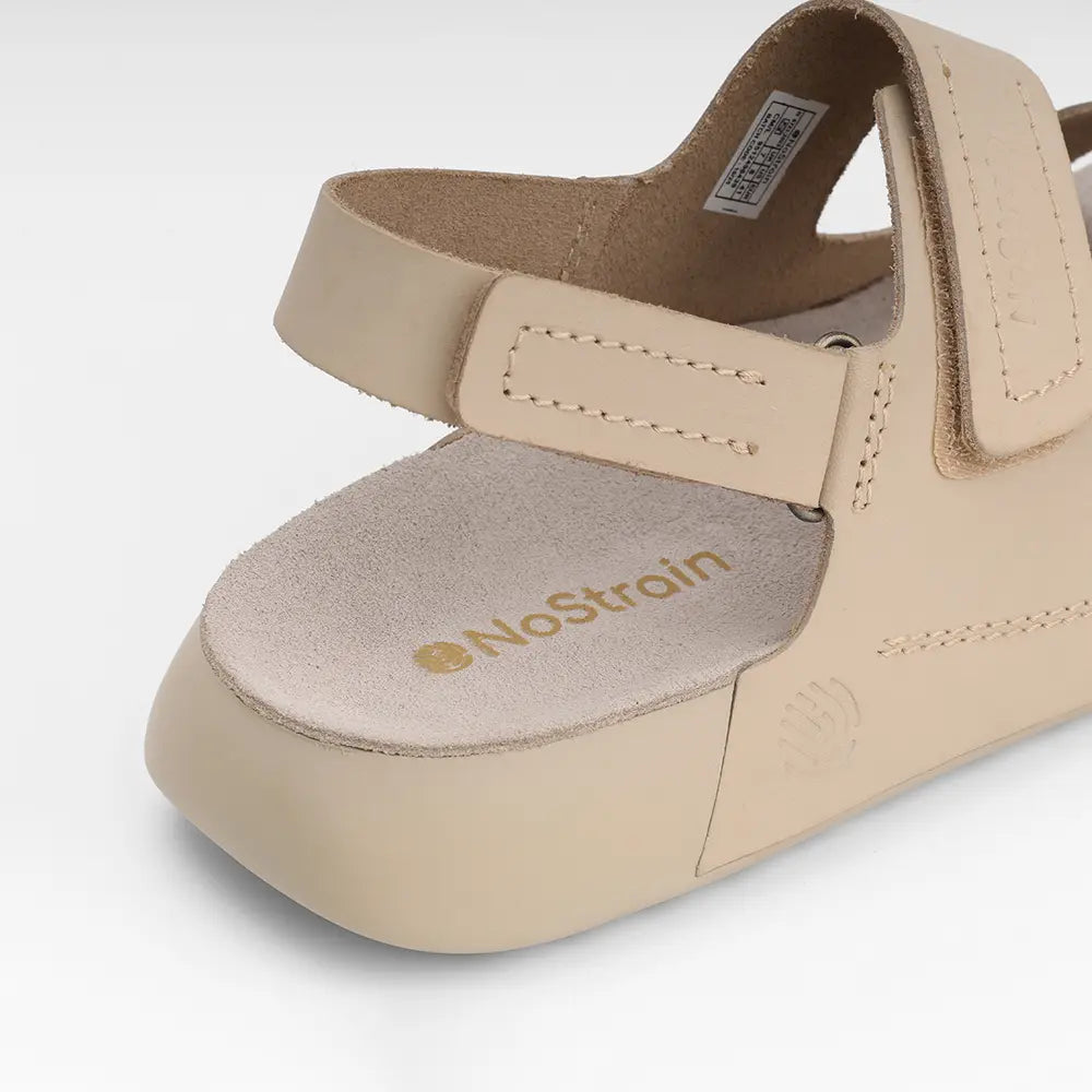 NoStrain women's leather sandals in beige with adjustable back straps and premium ISI mark quality.