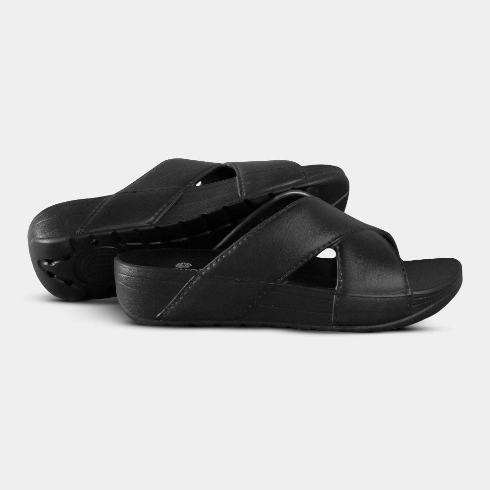 Elegant black slippers with wedge heel and soft cushioning support