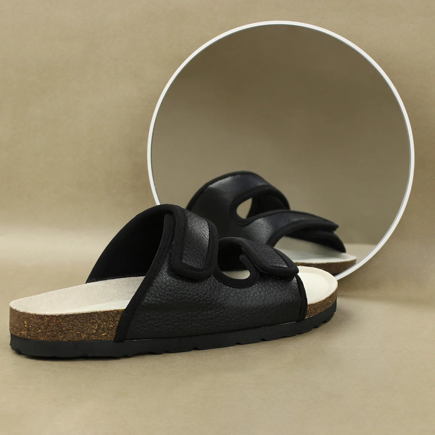 Stylish black cork sandals with molded footbed