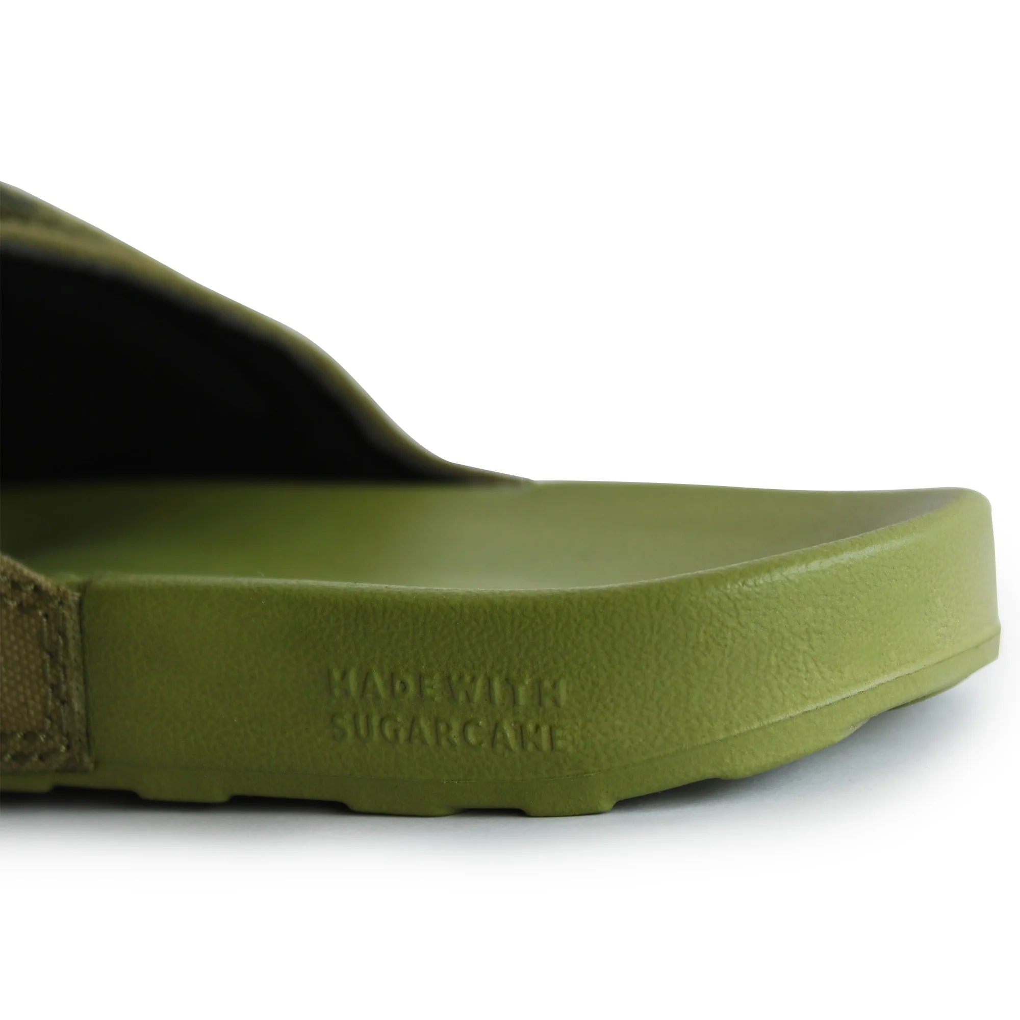 Close-up shot of branding and details on a pair of olive green Men's Sugar Sliders.