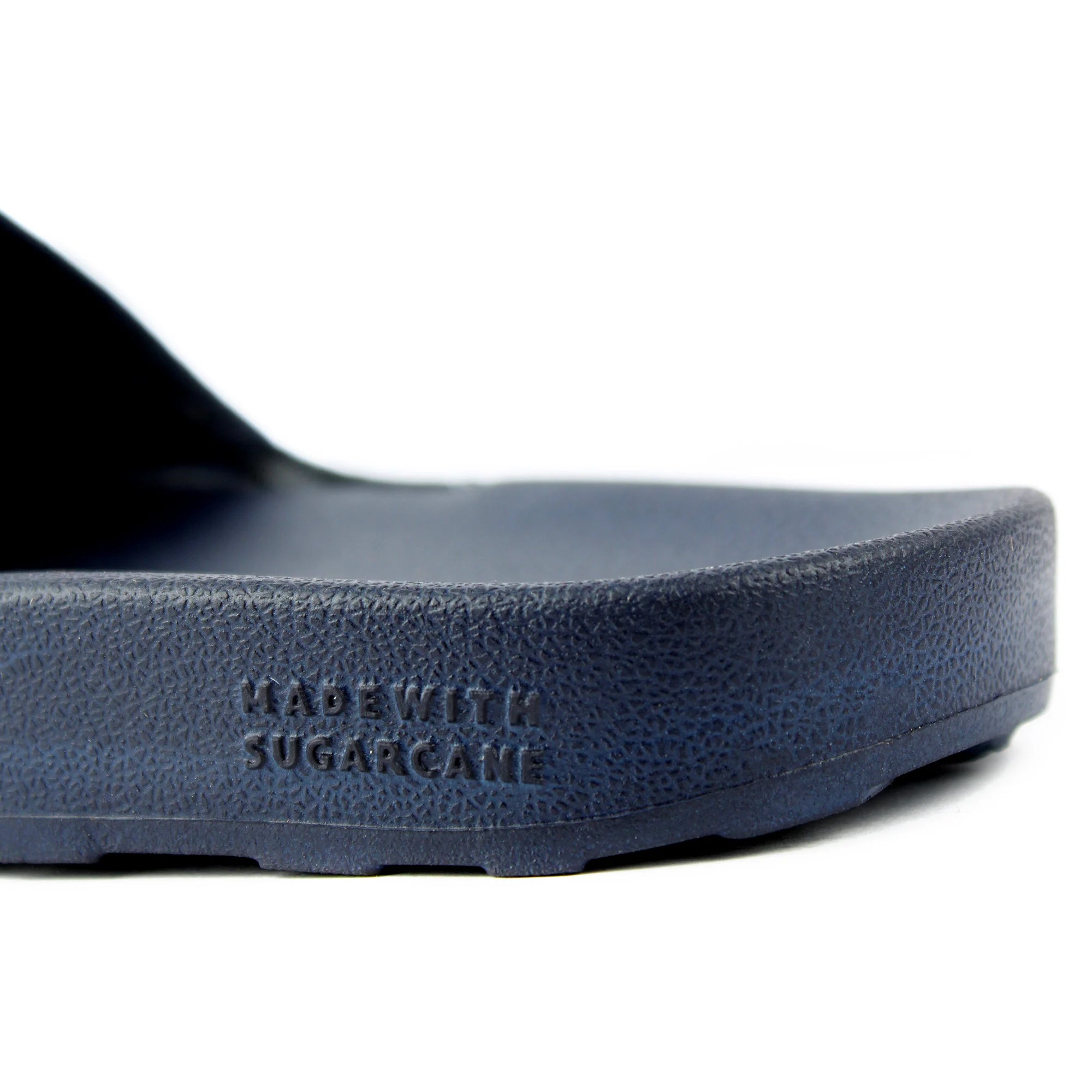 Discover the perfect blend of fashion and ease with Women's Navy Denim Sugar Sliders, a must-have choice.