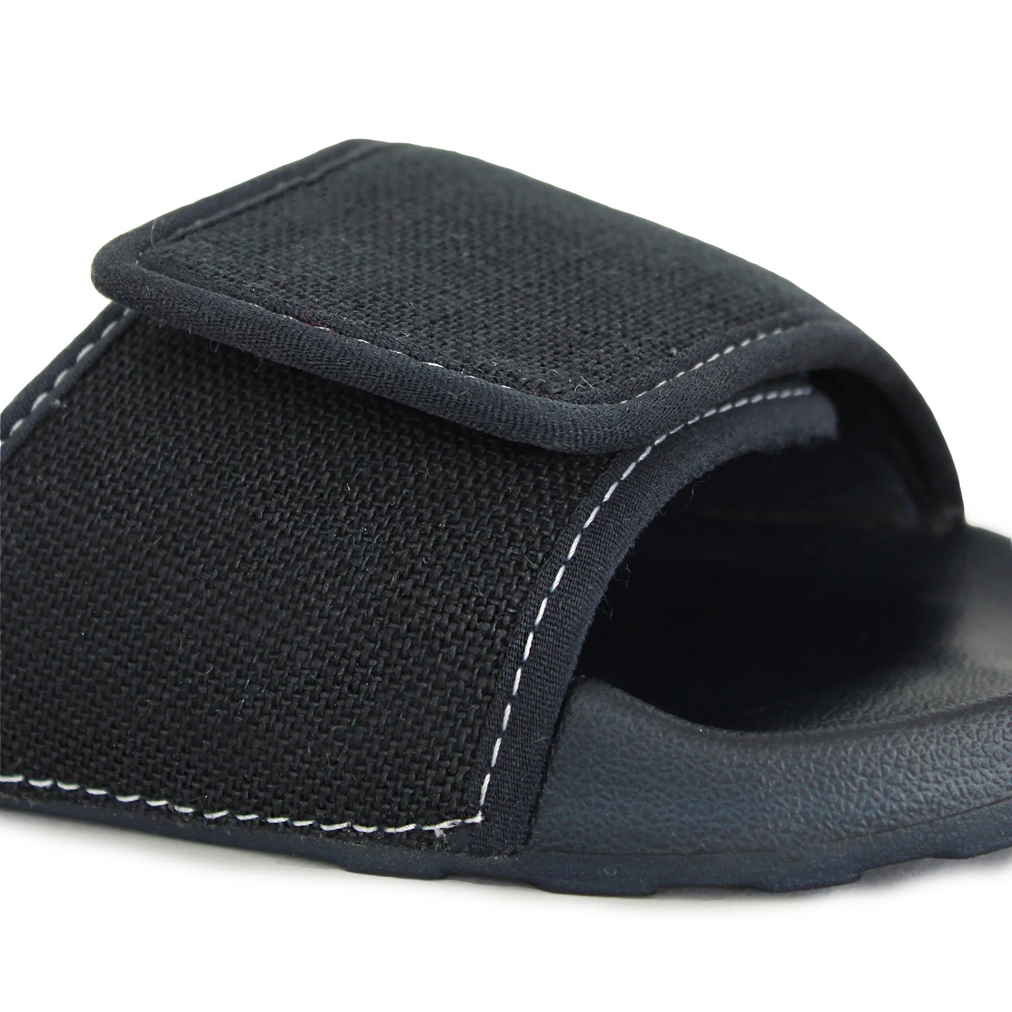 Make a fashion statement with Women's Dark Navy Linen Sugar Sliders, combining flair and comfort effortlessly.