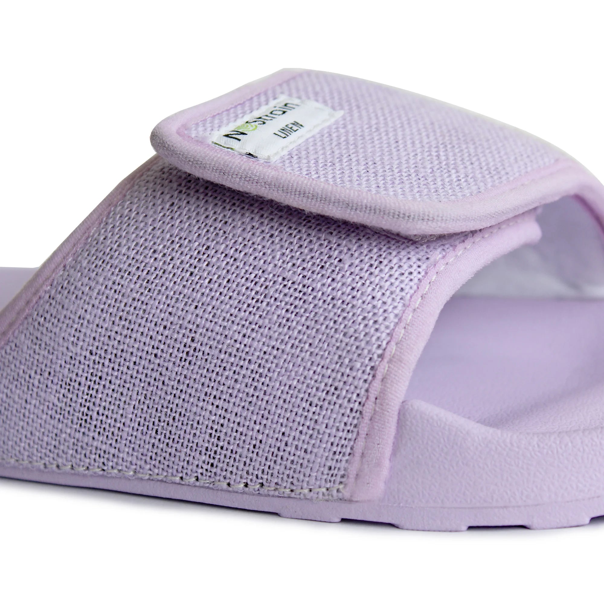 Make a subtle statement with Women's Lavender Bliss Linen Sugar Sliders, combining softness and sophistication.